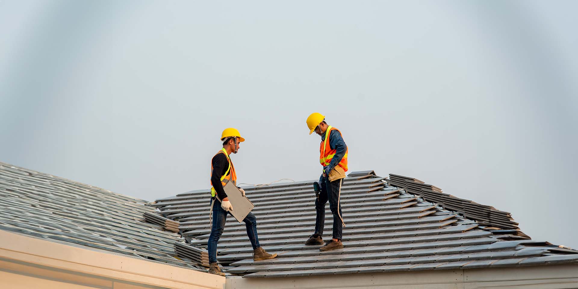 Skilled technician inspecting roof
