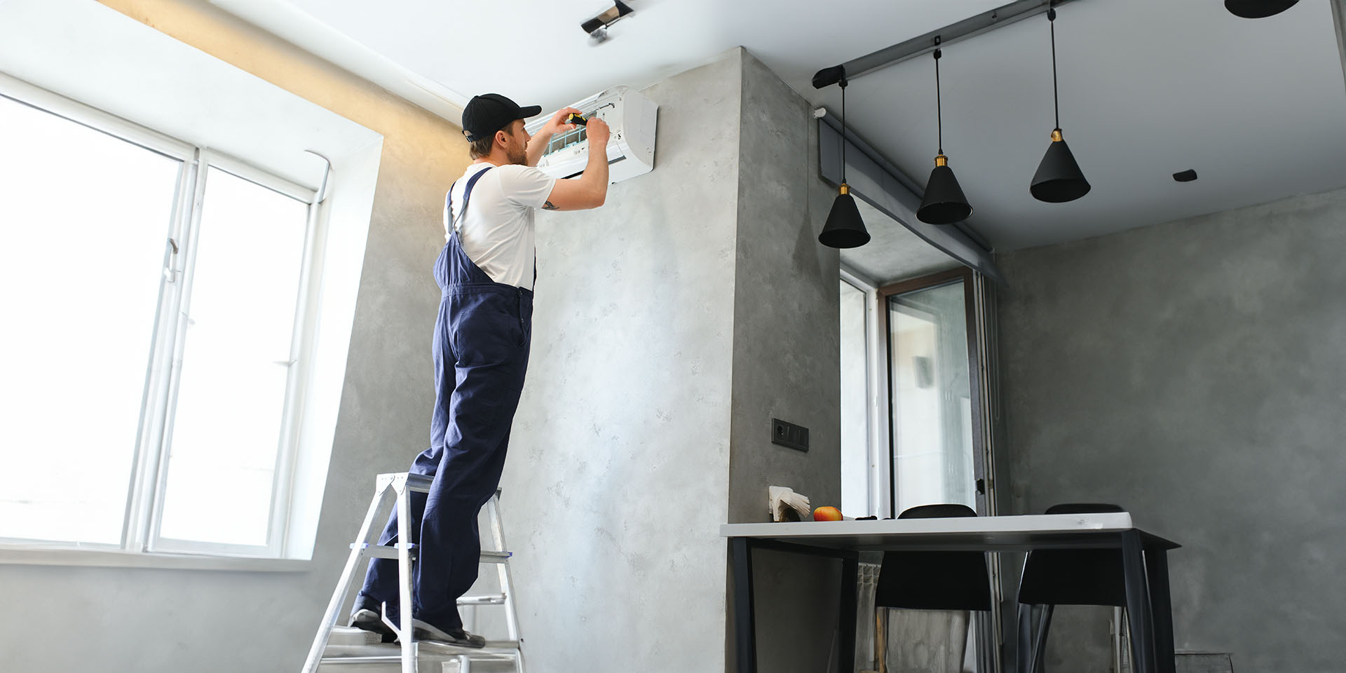 HVAC technician performing maintenance