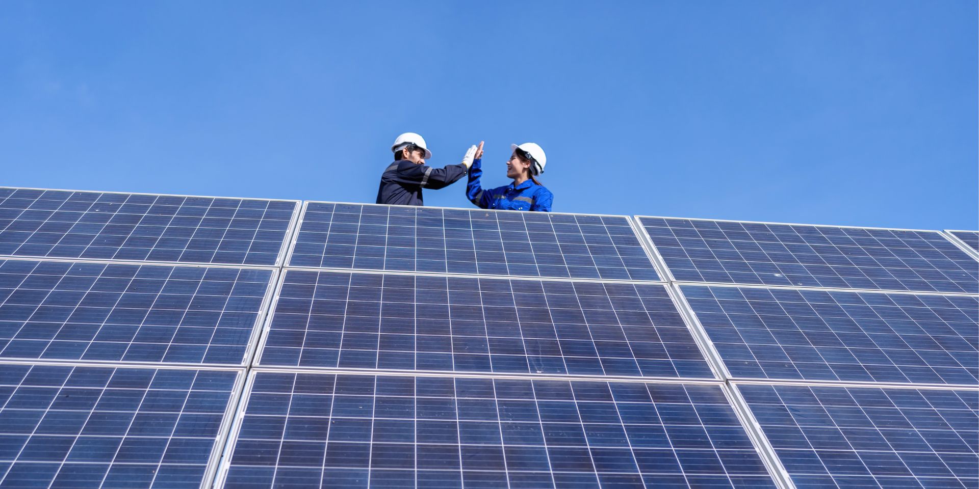 Trusted professionals from ManageLife conducting solar panel inspections with precision